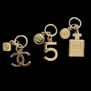 Lot CHANEL 2023 Holiday Christmas Ltd. Ed. Novelty Gold Pendant Key Chain Charms